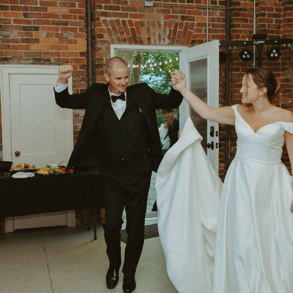 Couple Entering Wedding Reception